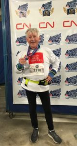 John Buchanan, with his 30K run medal